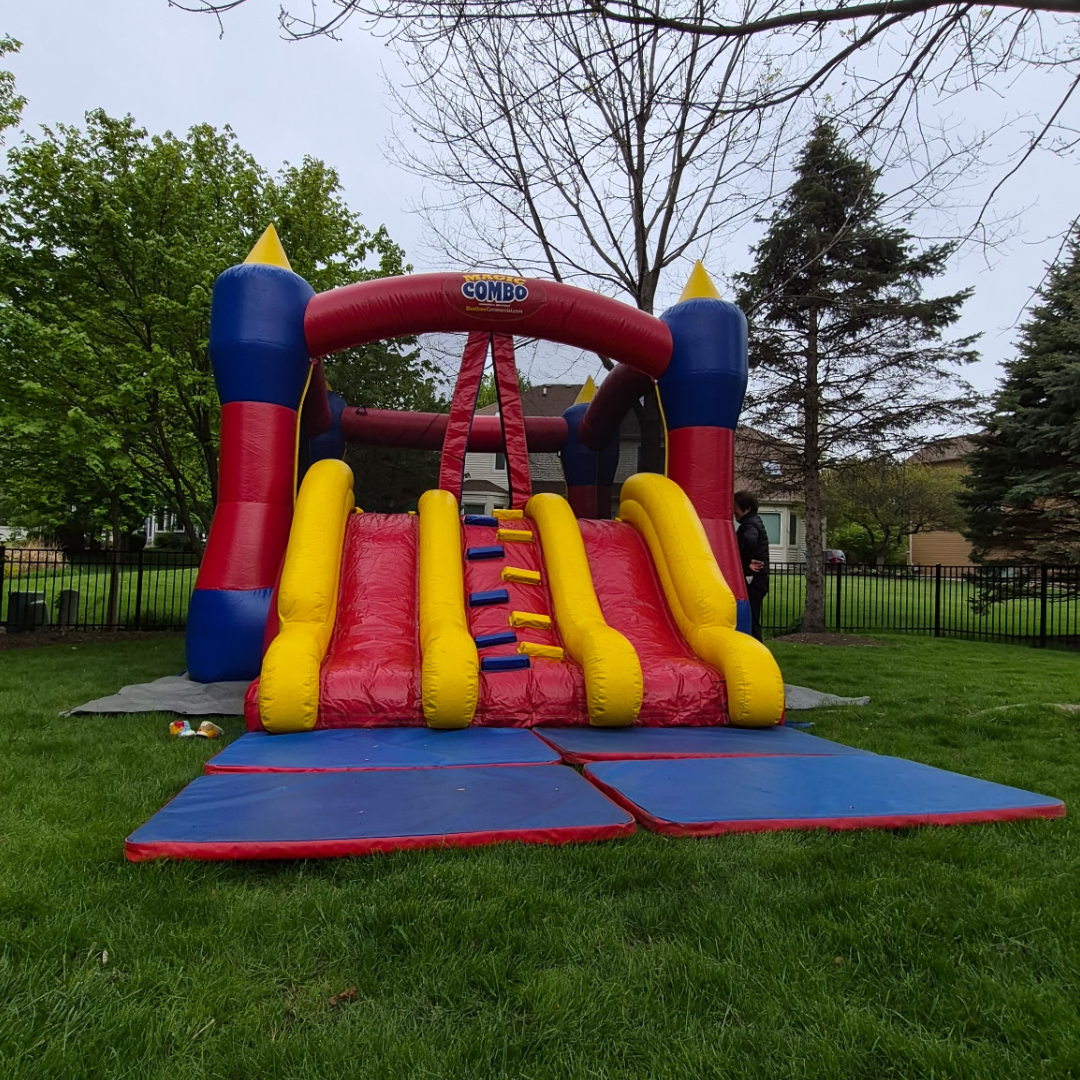 Magic Castle with Dual Slide Bounce N Slide combo unit for Chicago backyard parties.